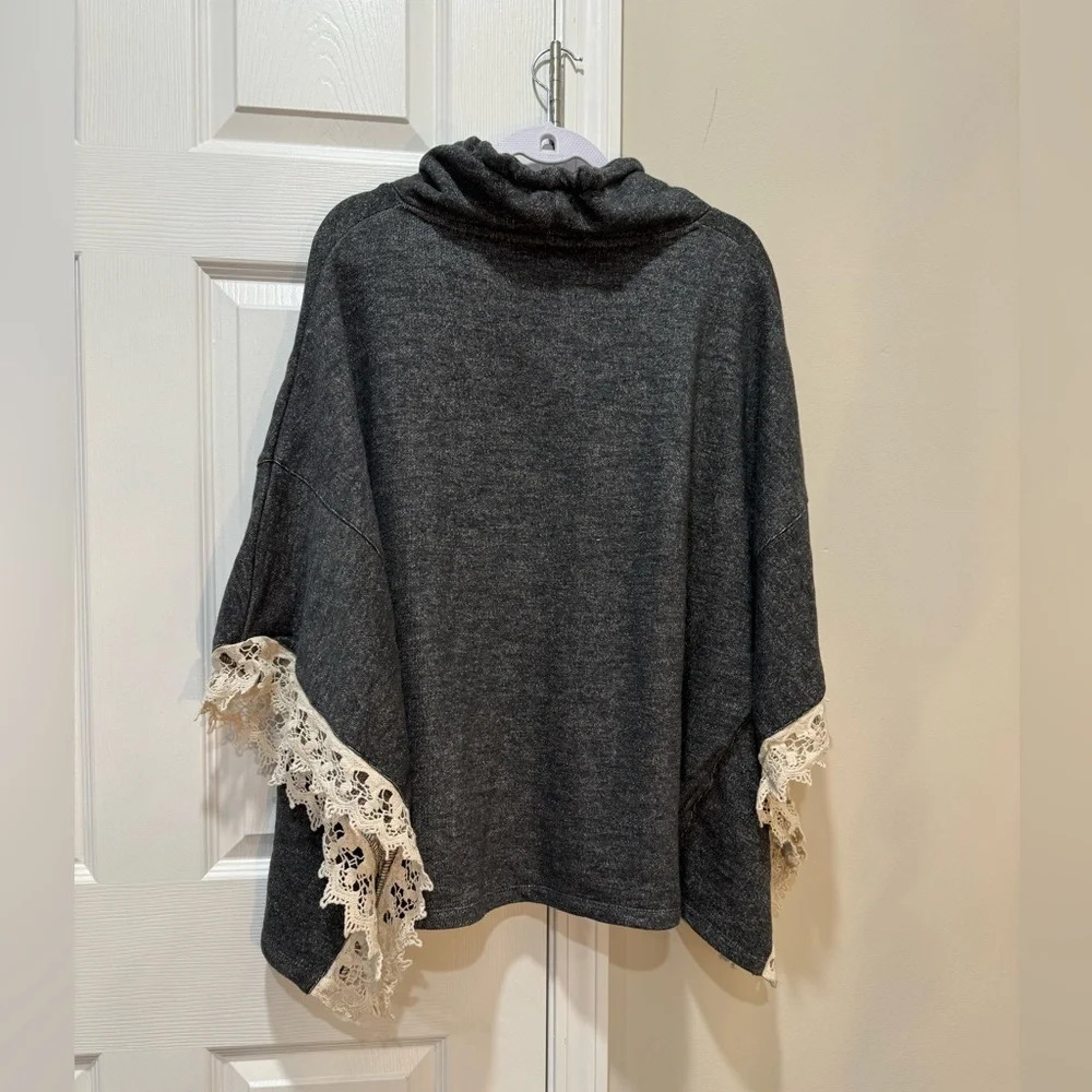 LOVE STITCH PONCHO ONE SIZE
FITS ALL WITH